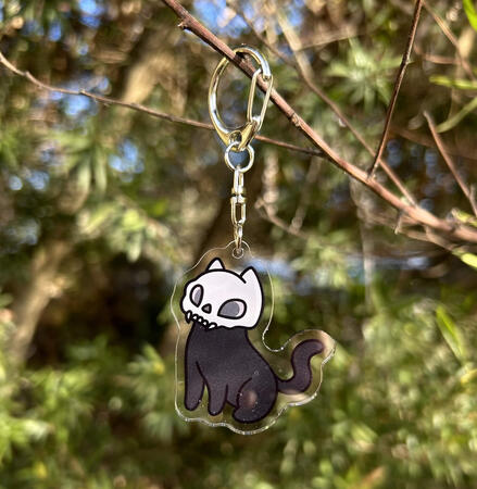 An acrylic keychain with double sided printing